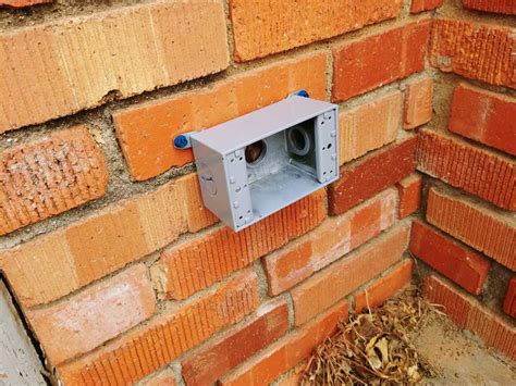 electrical box outdoor brick|brick house outdoor outlet box.